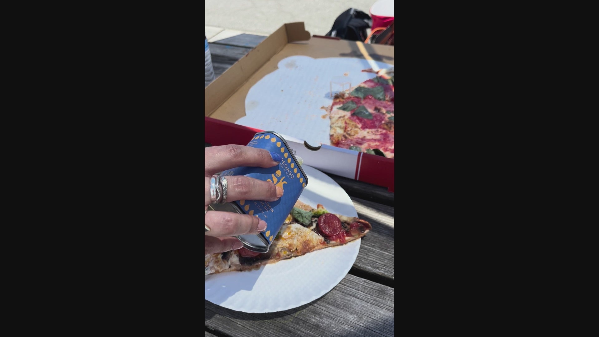 Pegaso EVOO drizzle pizza